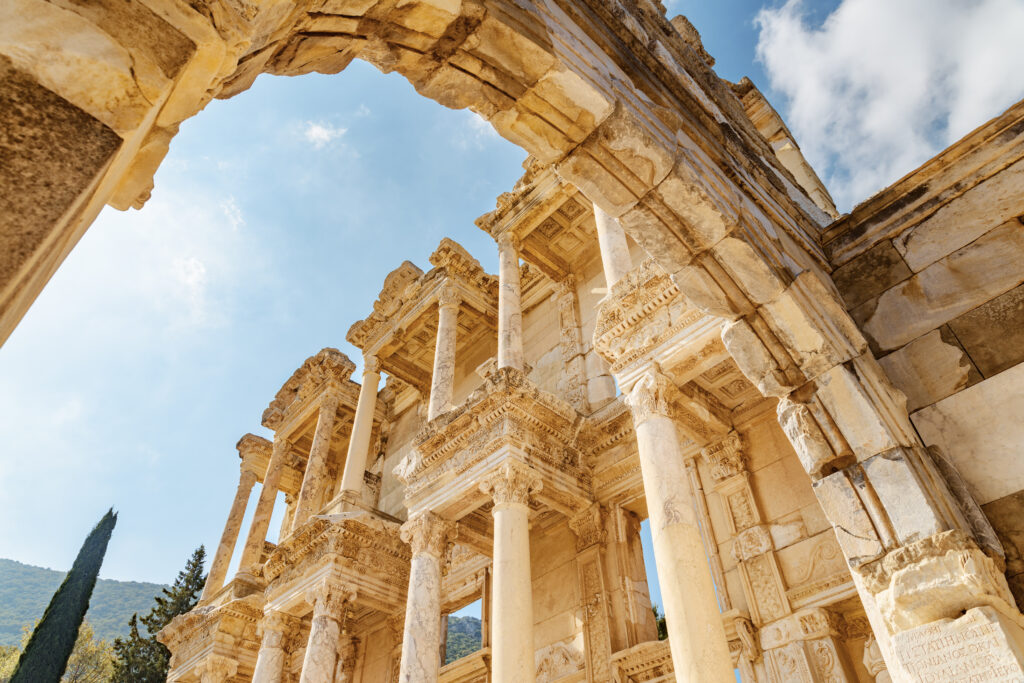 Awesome view of the Gate of Augustus and the Library of Celsus in Ephesus (Efes). Ruins of the ancient Greek city in Selcuk, Izmir Province, Turkey. Ephesus is a popular tourist attraction in Turkey.